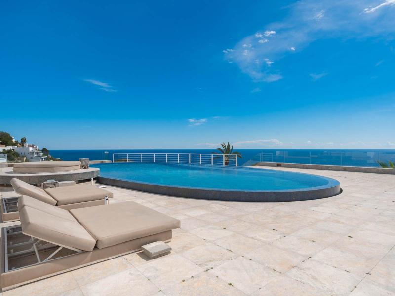 Luxury Property for Sale in Roca Llisa, Ibiza | Luxury real estate listing with stunning architecture and pool