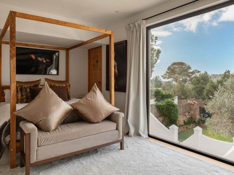 Authentic Ibiza Finca for Sale near Cala Salada | Luxury real estate listing with stunning exterior design and beautiful landscaping