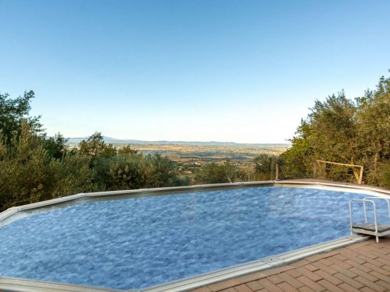 Restored Stone Country House with Pool and Olive Grove for Sale Near Cortona , Tuscany 