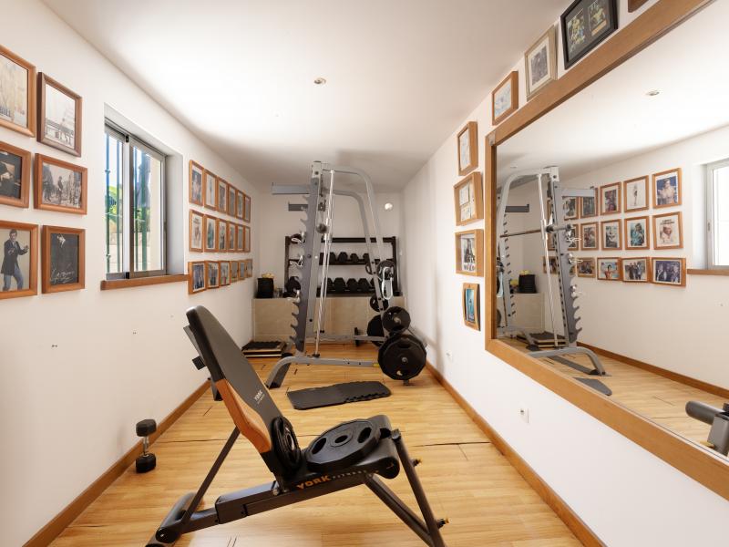 Algarve Villa for Sale in Galé – Coastal Living Near Albufeira | Luxury gym in a real estate listing